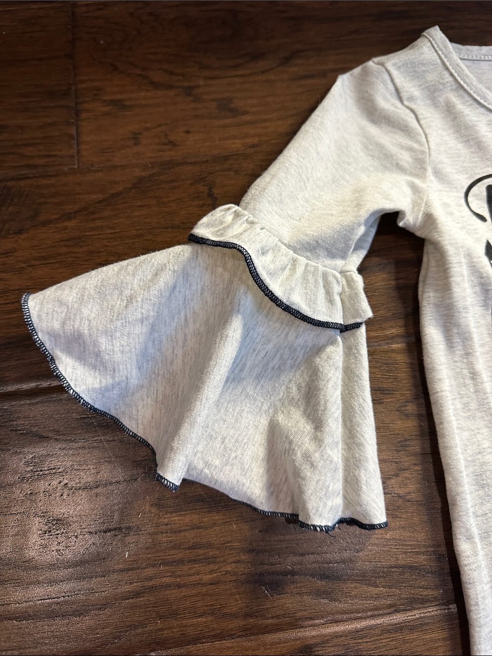 ‘Best Year Ever' Ruffle Romper - Picture 2 of 5